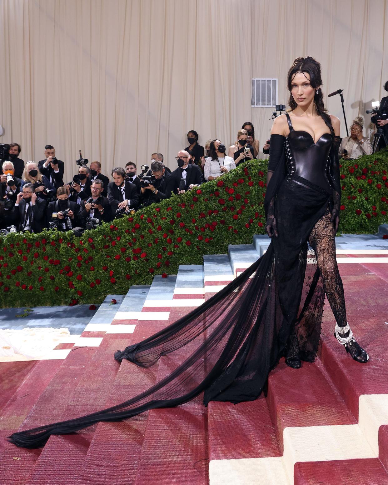 Bella Hadid in a black dress with a long train at the 2022 Met Gala