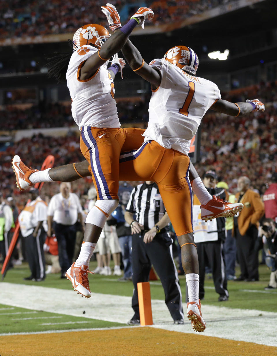Clemson wide receiver Martavis Bryant (1) celebrates with wide receiver Sammy Watkins, left, after scoring a touchdown during the first half of the Orange Bowl NCAA college football game against Ohio State, Friday, Jan. 3, 2014, in Miami Gardens, Fla. (AP Photo/Wilfredo Lee)