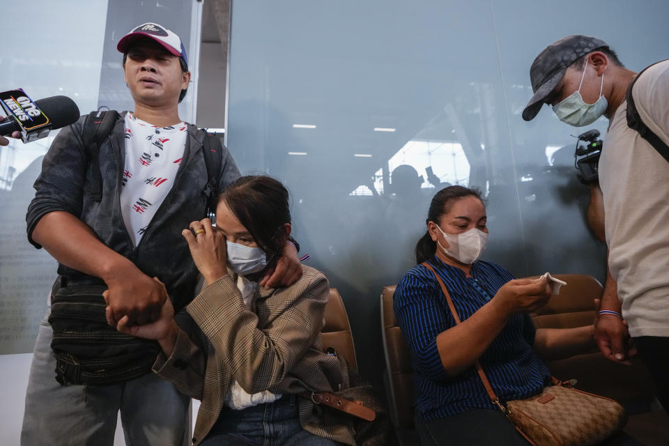 Thai overseas workers who were evacuates from Israel meet with their relatives on their arrival at Suvarnabhumi International Airport, in Samut Prakarn Province, Thailand, Thursday, Oct. 12, 2023. The first Thai nationals evacuated since the latest war between Israel and Hamas returned home Thursday. (AP Photo/Sakchai Lalit)