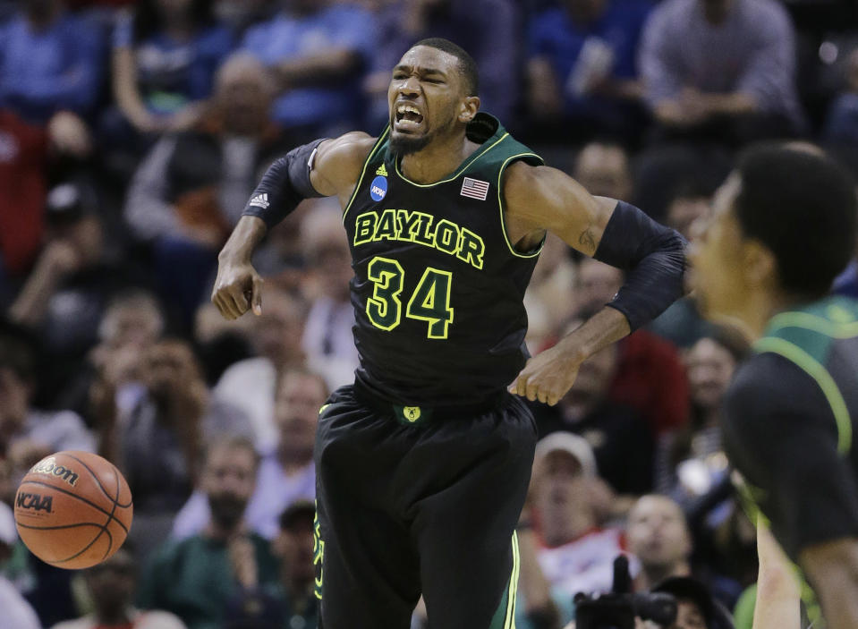 Baylor's Cory Jefferson (34) yells as he scores against Creighton during the second half of a third-round game in the NCAA college basketball tournament Sunday, March 23, 2014, in San Antonio. (AP Photo/Eric Gay)