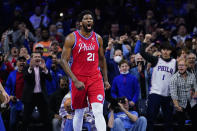 Philadelphia 76ers' Joel Embiid reacts after making a basket during the first half of Game 2 of an NBA basketball first-round playoff series against the Toronto Raptors, Monday, April 18, 2022, in Philadelphia. (AP Photo/Matt Slocum)