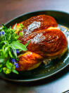 <div class="caption-credit">Photo by: Daniel Krieger</div><div class="caption-title">The NoMad, New York</div><p> <b>The NoMad</b> is a restaurant of its time: a multistarred chef (Daniel Humm) serving food more comforting than what he's known for (in this case Eleven Madison Park, where the menu is sixteen courses and $195) in a room that feels like a country home. The dish that encompasses that is a roast chicken that will make you rethink roast chicken. Humm says: "A cook delicately separates the skin from the meat and pipes in a mixture of brioche, butter, black truffle, and foie gras. The cavity is salted and filled with garlic, lemon, and herbs, then the bird is trussed and cooked in our hearth oven at 400 degrees... " <br> <b><br> MORE FROM ESQUIRE: <br></b> <b><a href="http://www.esquire.com/features/food-drink/fine-dining-etiquette?link=rel&dom=yah_life&src=syn&mag=esq" rel="nofollow noopener" target="_blank" data-ylk="slk:25 Sexy Dating Rules Every Man Should Follow;elm:context_link;itc:0;sec:content-canvas" class="link ">25 Sexy Dating Rules Every Man Should Follow</a><br></b> <br> </p>