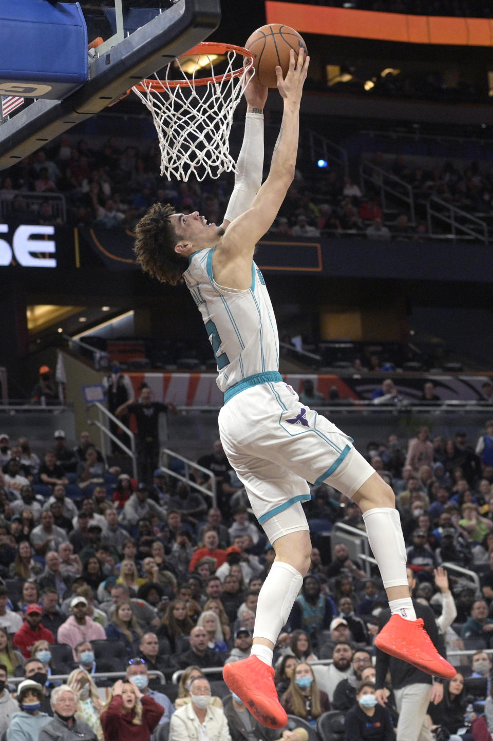 Charlotte Hornets guard LaMelo Ball (2) misses a dunk attempt during the first half of an NBA basketball game against the Orlando Magic, Wednesday, Nov. 24, 2021, in Orlando, Fla. (AP Photo/Phelan M. Ebenhack)