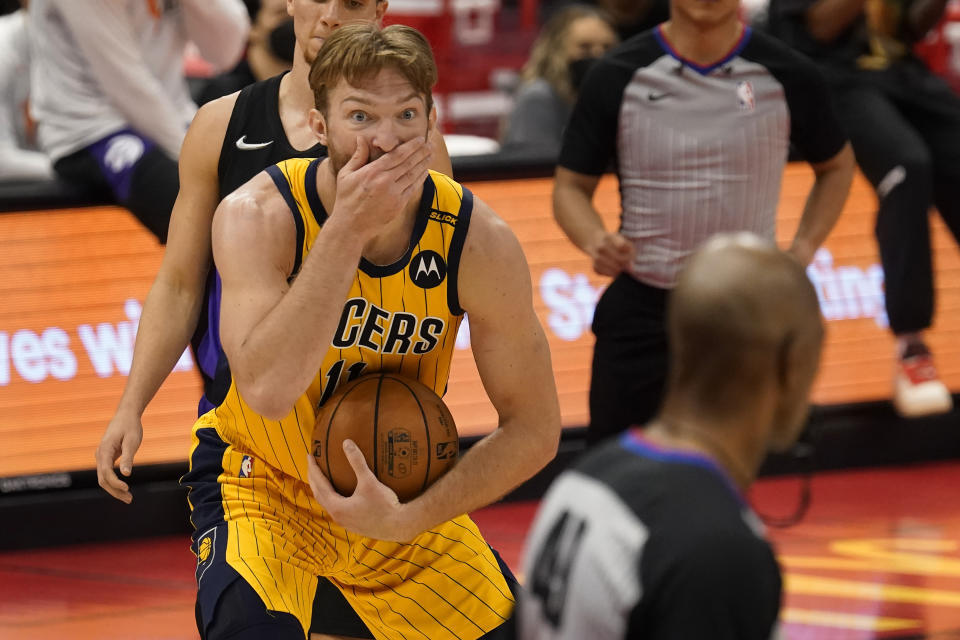 Indiana Pacers forward Domantas Sabonis (11) reacts as he is called for an offensive foul by referee Tom Washington (49) during the second half of an NBA basketball game against the Toronto Raptors Sunday, May 16, 2021, in Tampa, Fla. (AP Photo/Chris O'Meara)