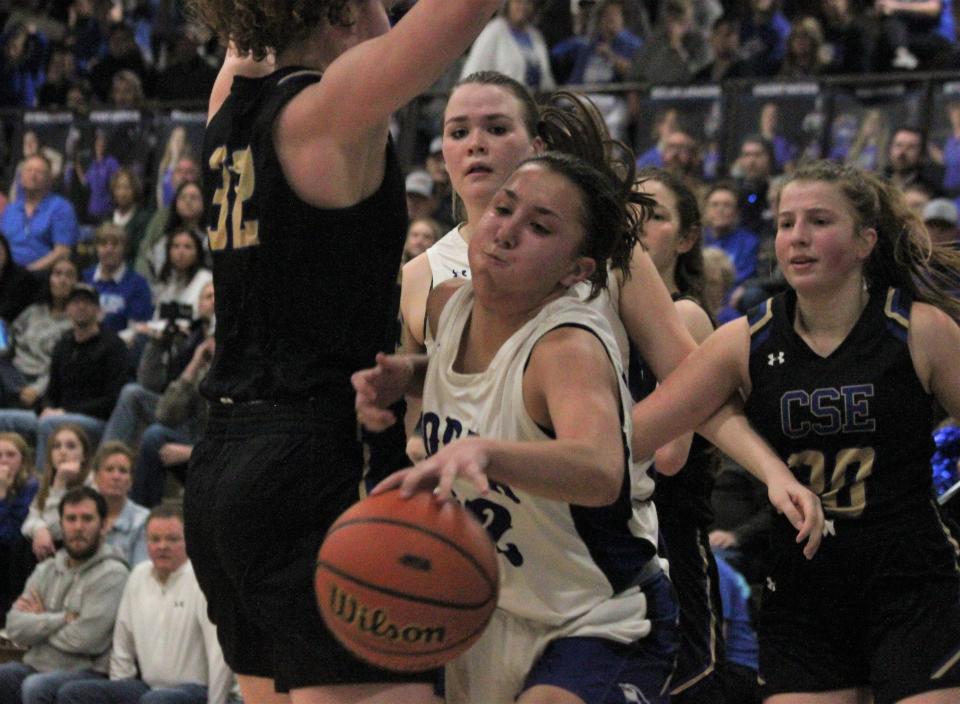 Petersburg PORTA/A-C Central's Aubrey Vogel collides into Camp Point Central/Southeastern's Amanda Stephens for a charge during the fourth quarter of the Class 2A PORTA Regional final on Thursday, Feb. 16, 2023.