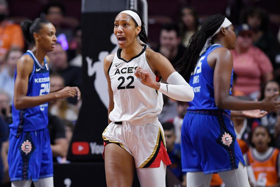 Las Vegas Aces' A'ja Wilson  (22) reacts after she was fouled during the first half in Game 4 of a WNBA basketball final playoff series against the Connecticut Sun, Sunday, Sept. 18, 2022, in Uncasville, Conn. (AP Photo/Jessica Hill)