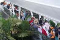 Fans arrive for the Formula One Miami Grand Prix auto race at Miami International Autodrome, Sunday, May 8, 2022, in Miami Gardens, Fla. (AP Photo/Wilfredo Lee)