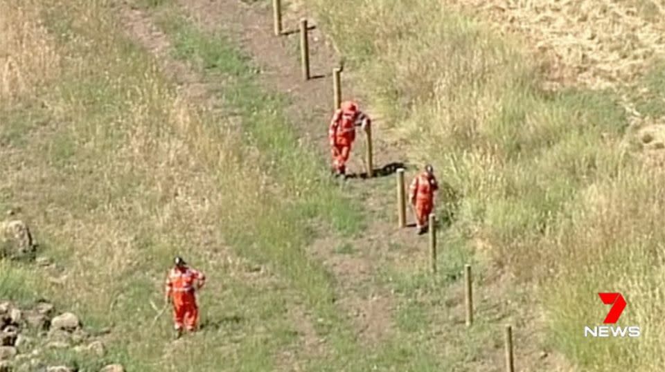 Authorities are seen scouring the area for a sign of missing mother Karen Ristevski. Photo: 7 News