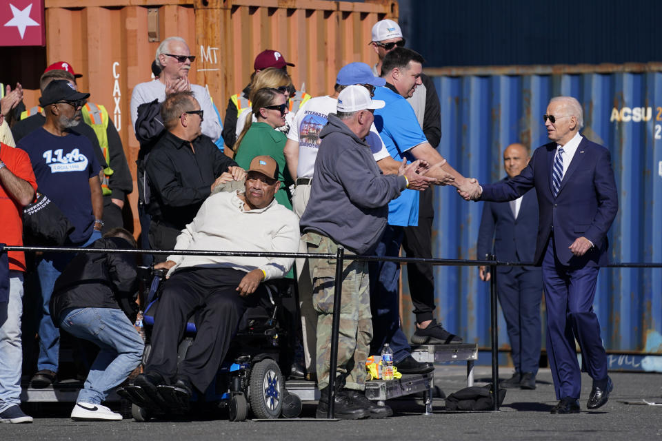 FILE - President Joe Biden greets people as he arrives to speak at Tioga Marine Terminal, Oct. 13, 2023, in Philadelphia. Despite a successful off-year election for Democrats, there remains a persistent fear within the party that there is a serious disconnect between the popularity of President Joe Biden's agenda and the man himself. (AP Photo/Evan Vucci, File)