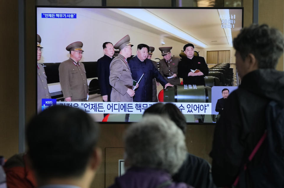 A TV screen shows an image of North Korean leader Kim Jong Un during a news program at the Seoul Railway Station in Seoul, South Korea, Tuesday, March 28, 2023. North Korea on Tuesday claimed it again detonated mock warheads during tests of nuclear-capable missiles and a purported underwater attack drone this week as leader Kim Jong Un called for his nuclear scientists to ramp up production of weapons-grade material to support a rapid expansion of delivery means. (AP Photo/Ahn Young-joon)