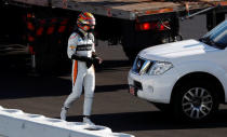 Motor Racing - F1 Formula One - Formula One Test Session - Circuit de Barcelona-Catalunya, Montmelo, Spain - March 6, 2018 McLaren's Stoffel Vandoorne leaves the track after his car broke down REUTERS/Juan Medina