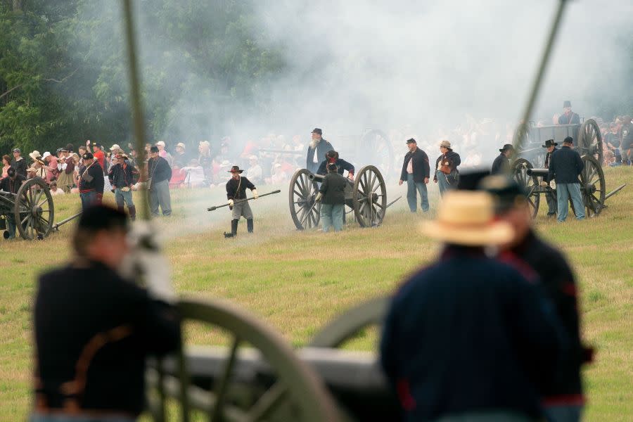 Reenactors fire cannons during the 160th reenactment of the Battle of Gettysburg, at Daniel Lady Farm in Gettysburg, Pennsylvania, on June 30, 2023. The Battle of Gettysburg, which is considered to be the bloodiest battle ever fought on US soil, occurred from July 1-July 3, 1863 during the US Civil War. Approximately 10,000 Union and Confederate troops were left dead, and another 30,000 wounded. Each year, the Gettysburg Battlefield Preservation Association holds a reenactment on the weekend closest to the original battle, hosting living history demonstrations and military reenactments to help teach people the history of the Civil War battle. (Photo by Stefani Reynolds / AFP) (Photo by STEFANI REYNOLDS/AFP via Getty Images)