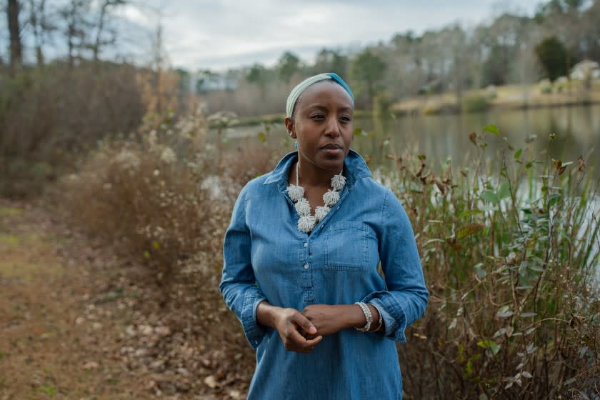 Dana Evans, 43, poses for a portrait at her home on Wednesday, Dec. 23, 2020 in Stockbridge, Ga. Photo by Kevin D. Liles for the Los Angeles Times