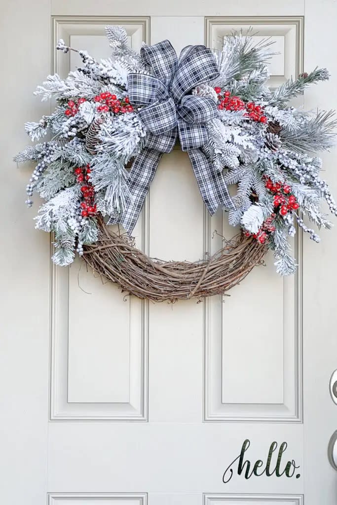 snow and berries on a grapevine wreath (StoneGable)