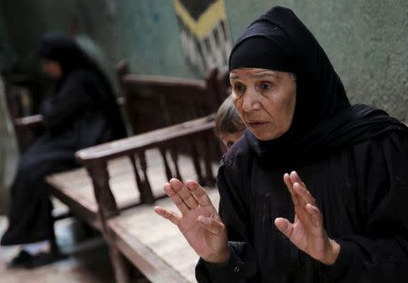 Fathia Hashem, mother of Amr Abushanab, who died in police custody, speaks with Reuters during an interview at their house in Tahanoub village, Egypt, November 30, 2015. REUTERS/Amr Abdallah Dalsh