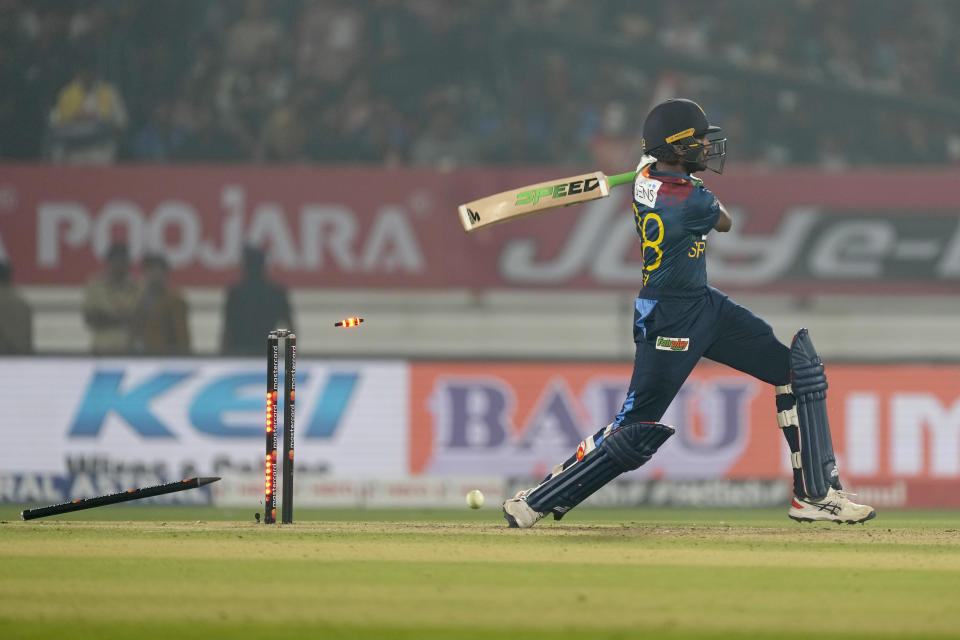 Sri Lanka's Dilshan Madushanka is bowled out by India's Arshdeep Singh during the third T20 cricket match between India and Sri Lanka, in Rajkot, India, Saturday, Jan. 7, 2023. (AP Photo/Ajit Solanki)