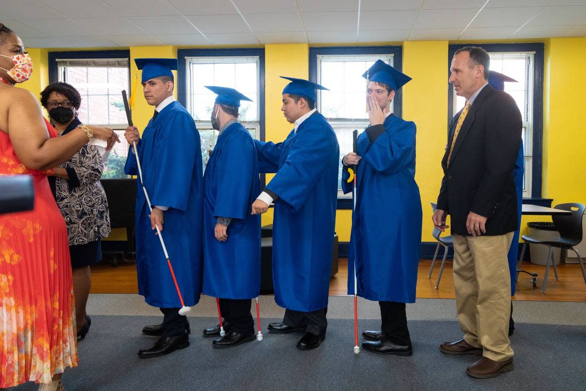 Class of 2022 Graduates wait in line before entering the auditorium for the Governor Morehead School’s Commencement Ceremony at Lineberry Hall in Raleigh, N.C. on Friday, June 3, 2022. Students come from across the state to the K-12 school for its education services for the deaf and visually impaired.