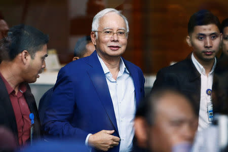 Malaysia's former prime minister Najib Razak leaves after giving a statement to the Malaysian Anti-Corruption Commission (MACC) in Putrajaya, Malaysia May 22, 2018. REUTERS/Lai Seng Sin