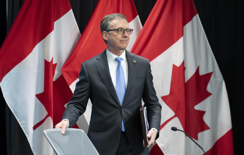 Bank of Canada Governor Tiff Macklem takes his seat as he arrives for a news conference, Wednesday, April 13, 2022 in Ottawa.  THE CANADIAN PRESS/Adrian Wyld