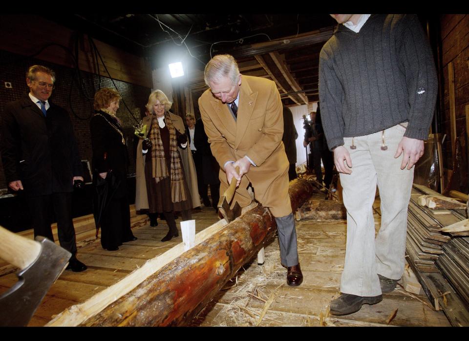Prince Charles looks like the perfect definition of a woodchopper.     (AFP photo)