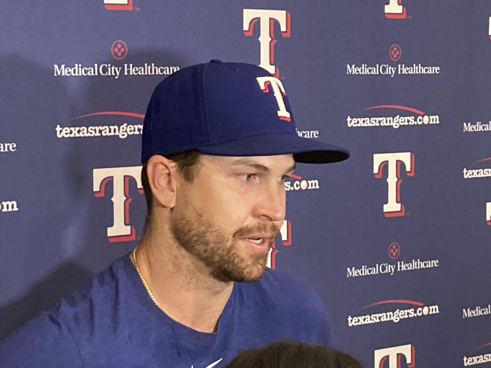 Texas Rangers pitcher Jacob deGrom speaks to the media during a baseball news conference in Arlington, Texas, Tuesday, June 6, 2023. DeGrom will have season-ending Tommy John surgery, cutting short his first season after the oft-injured right-hander signed a $185 million, five-year contract with the AL West-leading Rangers. (AP Photo/Stephen Hawkins)