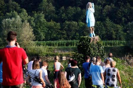 Life-size wooden sculpture of U.S. first lady Melania Trump is officially unveiled in Rozno, near her hometown of Sevnica