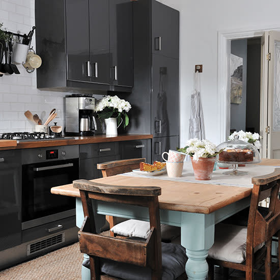 Reverse the tables with a glossy rough-luxe kitchen