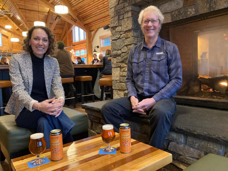 Adeline Druart, CEO of Lawson's Finest Liquids, and founding brewer Sean Lawson sit at the Waitsfield taproom Jan. 23, 2024.