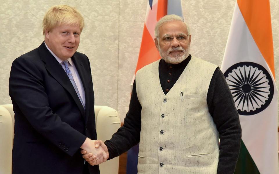 The trip, which had already been scaled down from the original plans, would have been Boris Johnson's first major bilateral visit to another country CREDIT: AFP - AP