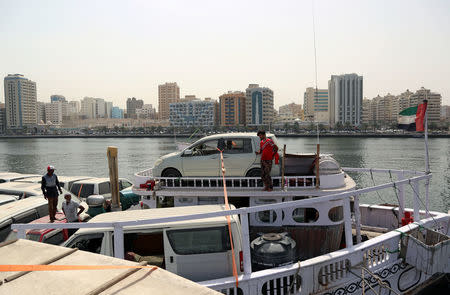 Used cars stand on a dhow at Port Khaled in Sharjah, UAE April 5, 2018. Picture taken April 5, 2018. REUTERS/Satish Kumar