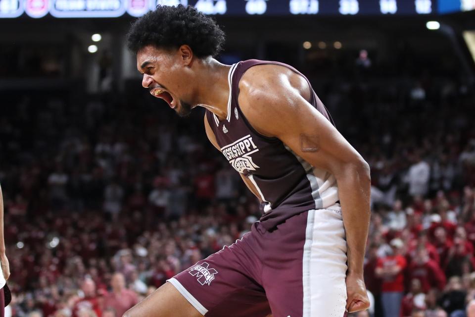 Feb 11, 2023; Fayetteville, Arkansas, USA; Mississippi State Bulldogs forward Tolu Smith (1) celebrates after scoring against the Arkansas Razorbacks during the second half at Bud Walton Arena. Bulldogs won 70-64. Mandatory Credit: Nelson Chenault-USA TODAY Sports