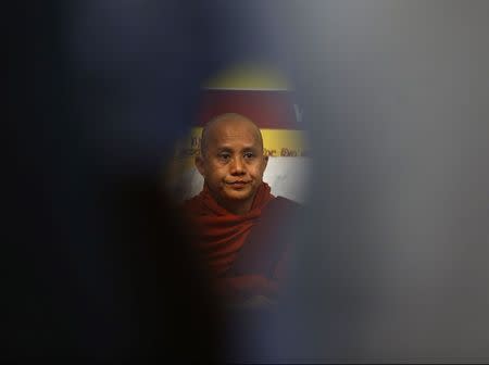 Buddhist monk Ashin Wirathu looks on during a news conference in Colombo September 30, 2014. REUTERS/Dinuka Liyanawatte
