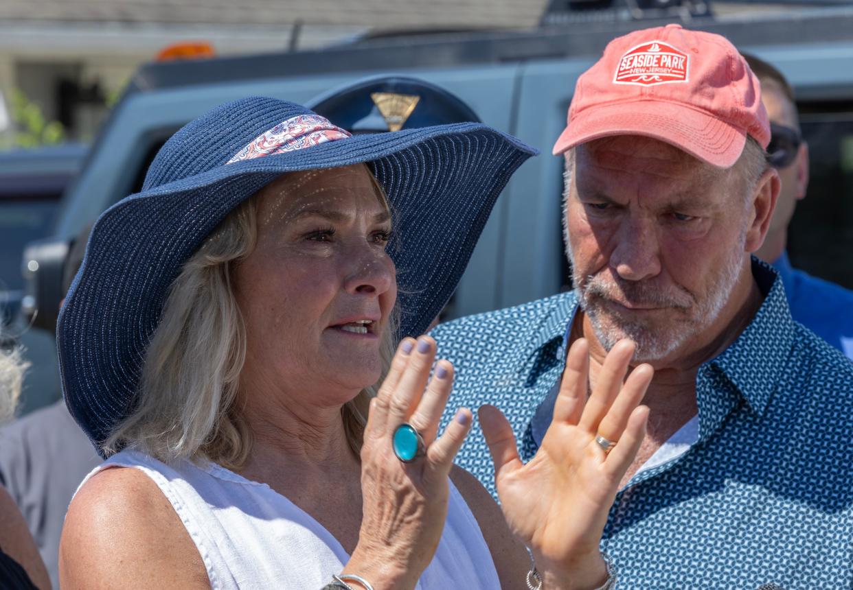 Julia Madsen’s daughter Eileen Tummino, standing next to her brother Guy Madsen, talks about her mother, who disappeared 15 years ago from South Seaside Park, at a news conference called Tuesday to bring attention the case.