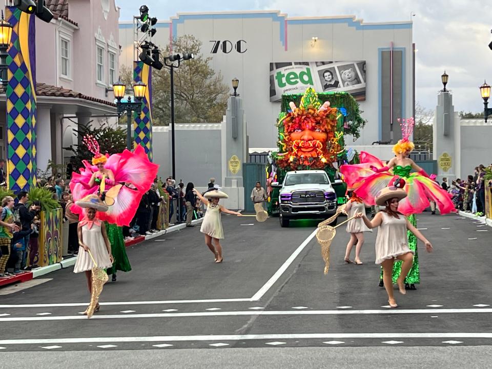 Like the multicultural foods available during Mardi Gras, the wide array of performers helps guests see people like themselves in the parade. Lora Sauls said they tell performers, "'You are you ... The mushrooms, you're not mushrooms. You are you, in a mushroom costume.'"