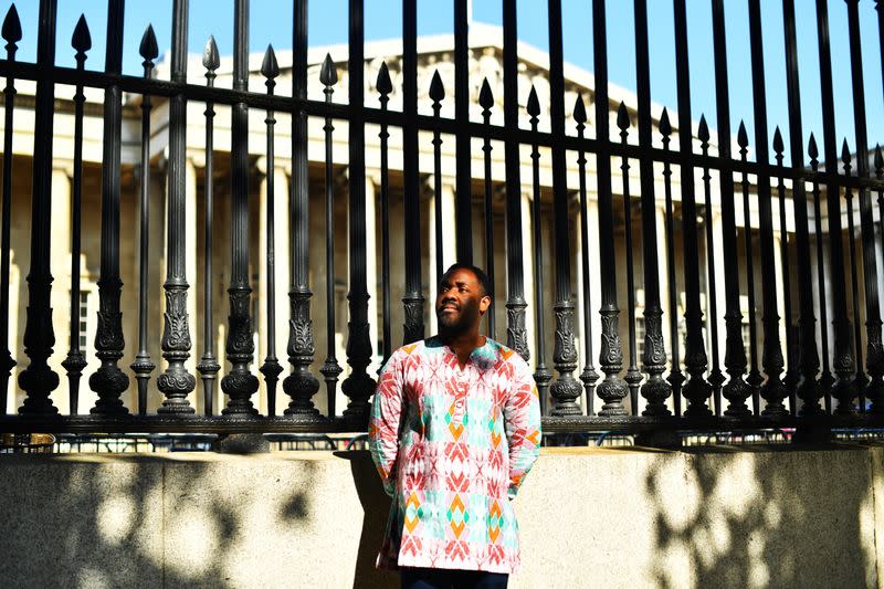 Nigerian artist Osarobo Zeickner-Okoro stands outside the British Museum