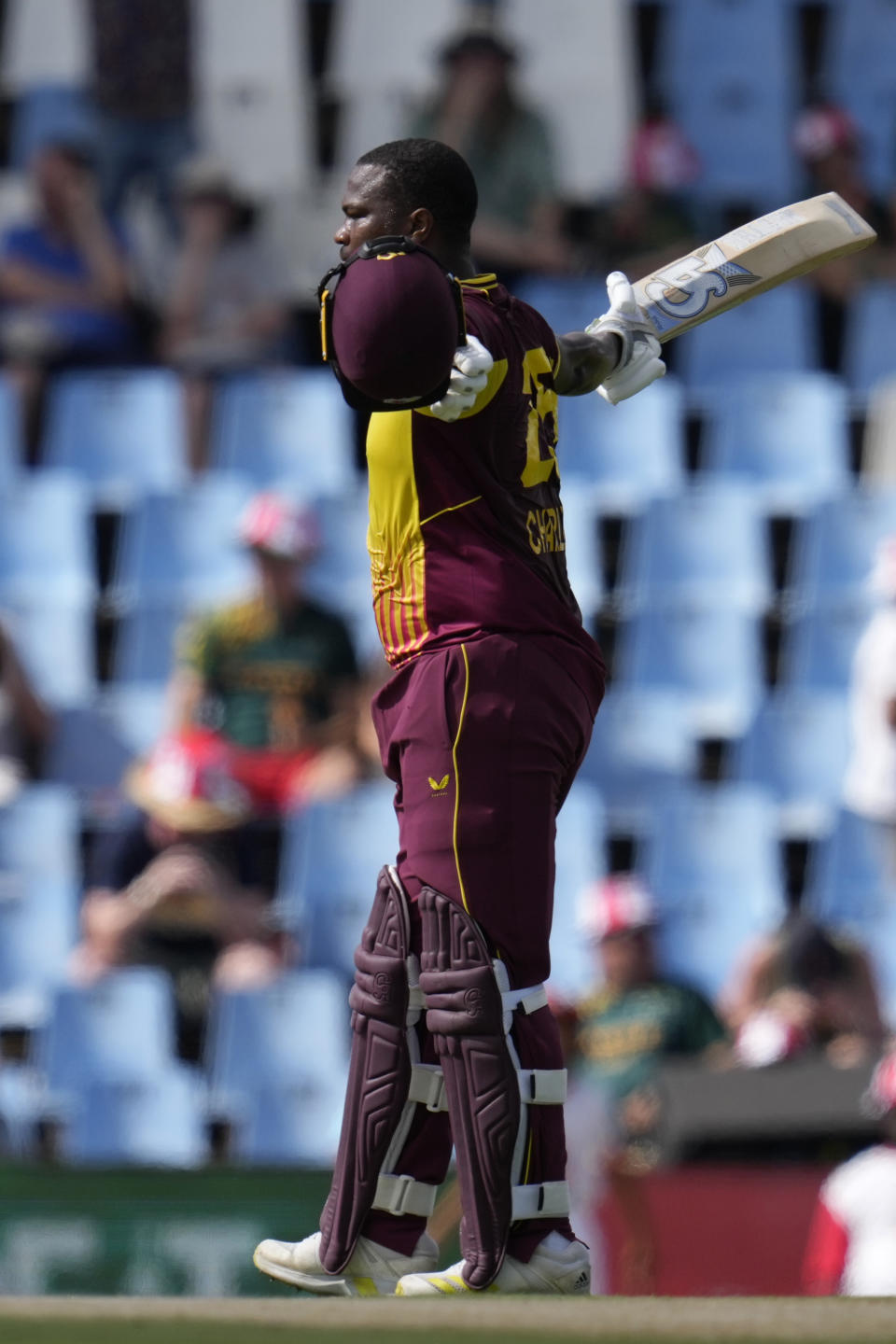 West Indies's batsman Johnson Charles celebrates his century during the second T20 cricket match between South Africa and West Indies, at Centurion Park, in Pretoria, South Africa, Sunday, March 26, 2023. (AP Photo/Themba Hadebe)