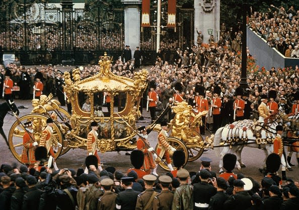 Queen Elizabeth II rode in the Gold State Coach during her Coronation procession