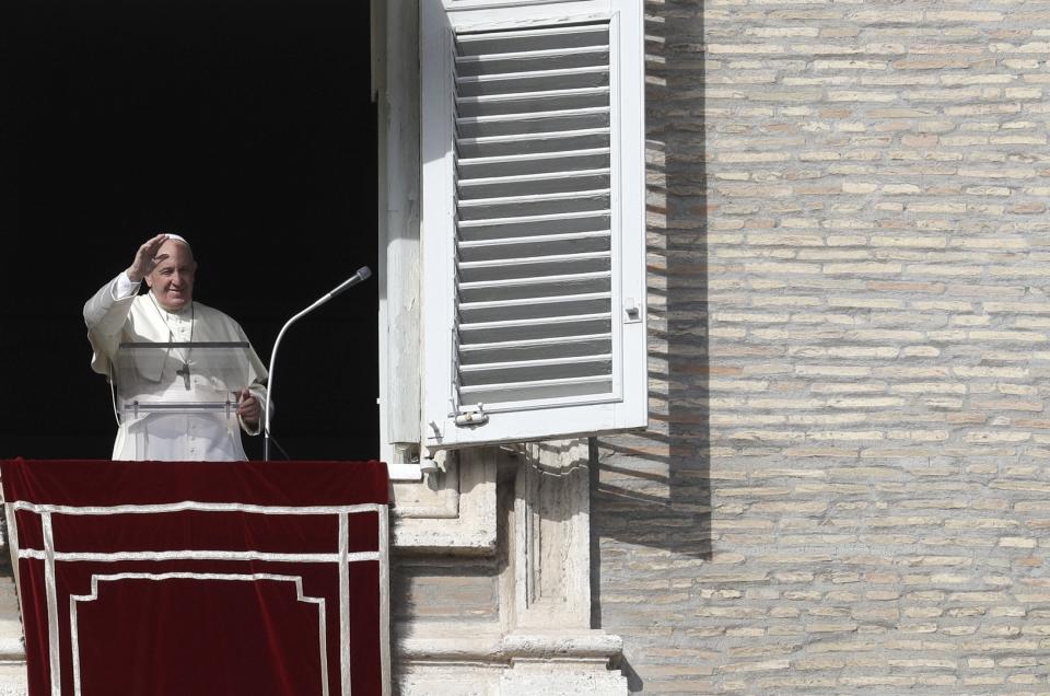 Pope Francis delivers his blessing during his Angelus prayer from his studio window overlooking St. Peter's Square, at the Vatican, Sunday, Nov. 10, 2019. (AP Photo/Gregorio Borgia)