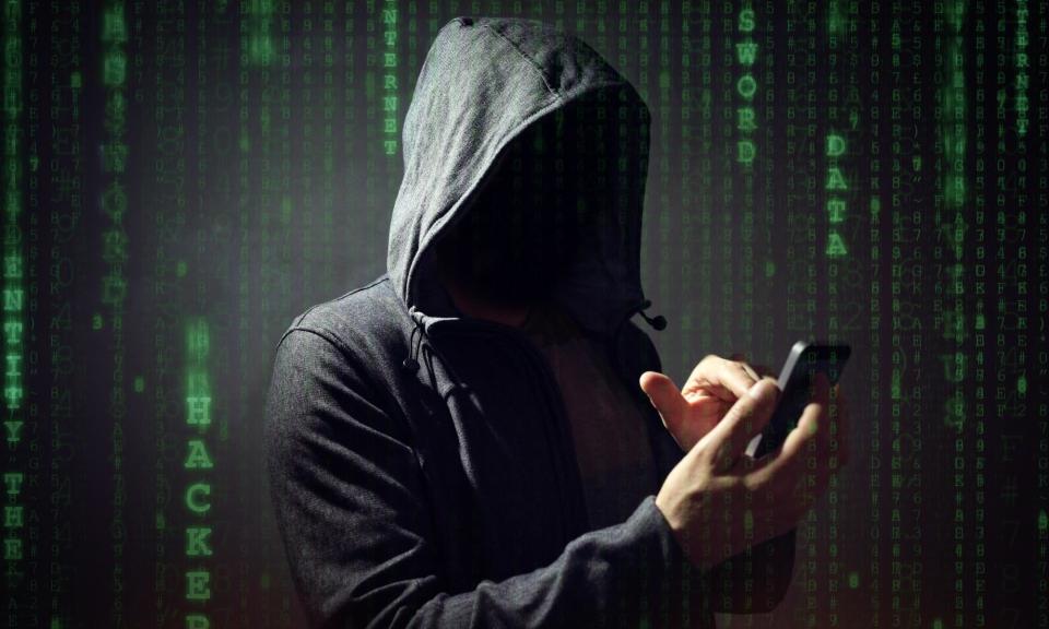 <span>Fraudsters, armed with a phone with a replacement sim they ordered, can receive verification codes to access the victim’s bank account.</span><span>Photograph: Brian Jackson/Alamy</span>