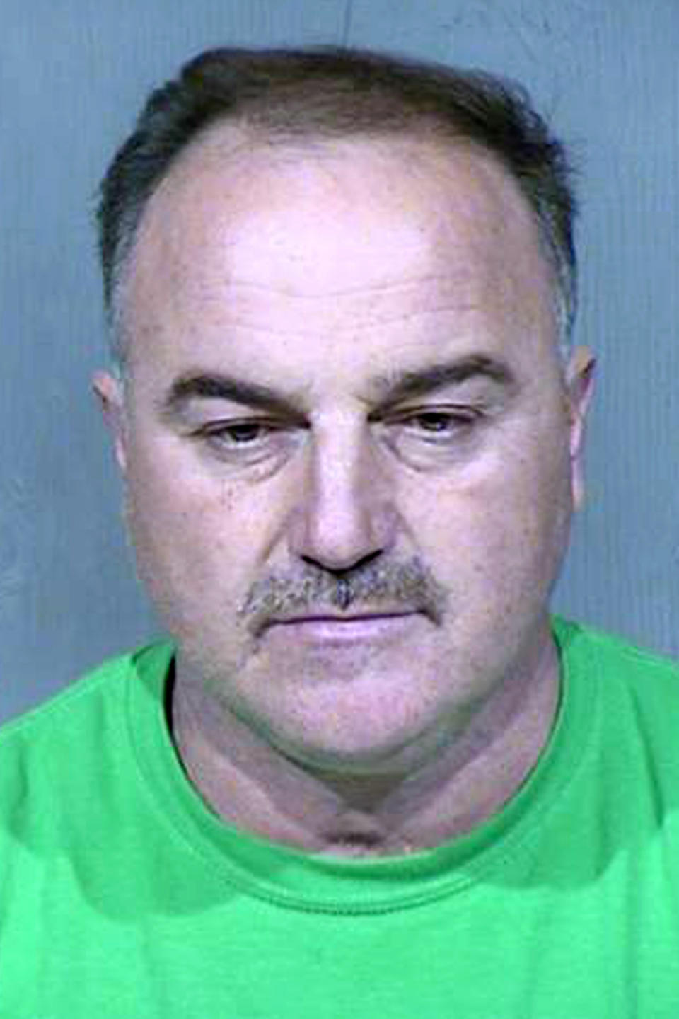 FILE - This undated booking photo provided by the Maricopa County Sheriff's Office shows Ali Yousif Ahmed Al-Nouri, who was arrested in January 2020 in Arizona as part of an extradition request made by the Iraqi government and has been accused of participating in the 2006 killing of two police officers in Iraq. A judge in Phoenix will hold a hearing on Thursday, July 15, 2021, over whether to sign off on a request to extradite Ahmed to Iraq. Ahmed has denied involvement in the killings. (Maricopa County Sheriff's Office via AP)