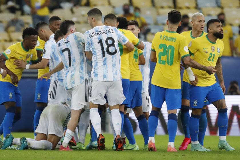 Players of Argentina and Brazil face off during the Copa America.