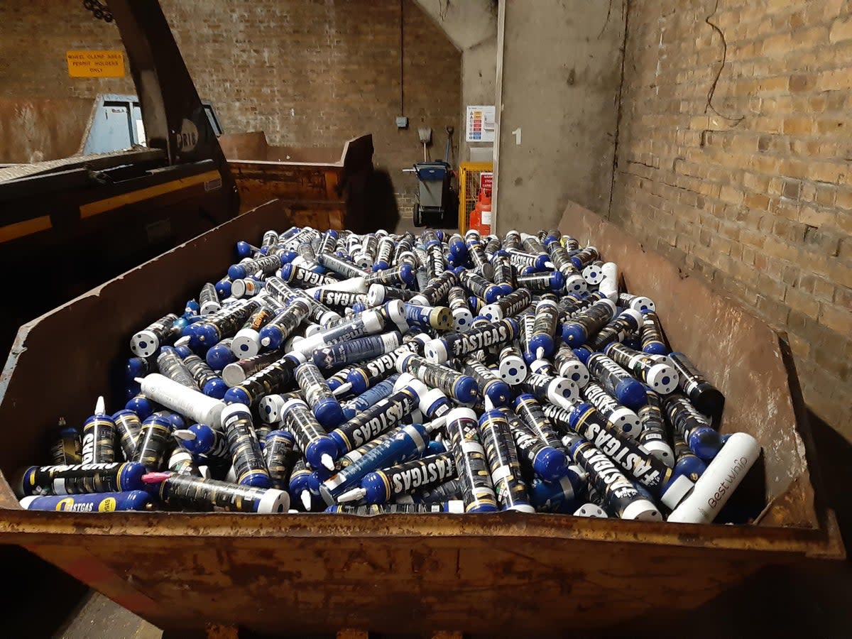 A skip full of laughing gas canisters collected after Notting Hill Carnival (Kensington & Chelsea council)