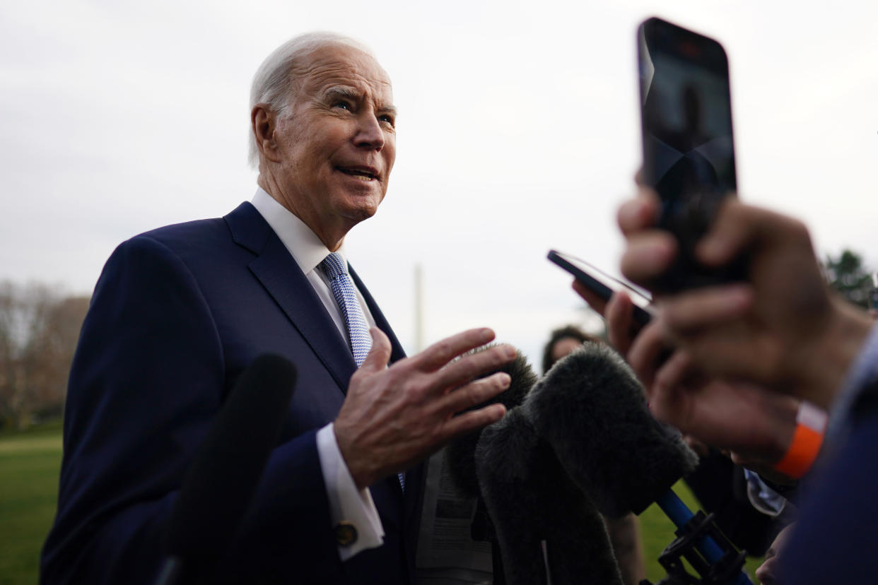 President Biden speaks to members of the media before boarding Marine One on Feb. 24. 