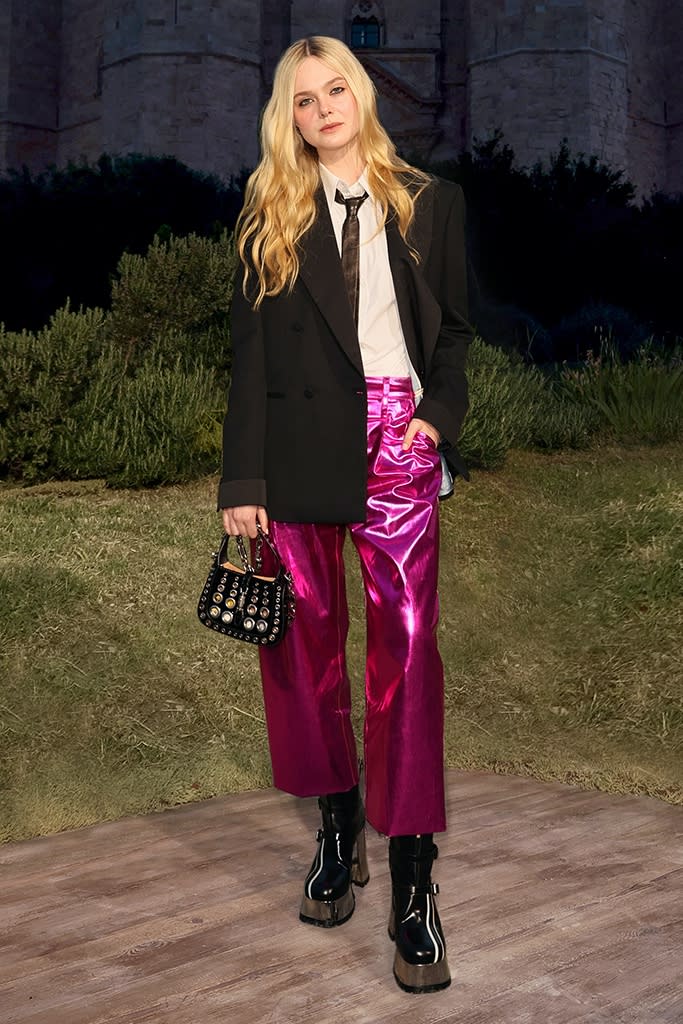 Elle Fanning attends Gucci’s “Cosmogonie” Resort 2023 runway show in Puglia, Italy on May 16, 2022. - Credit: Courtesy of Getty