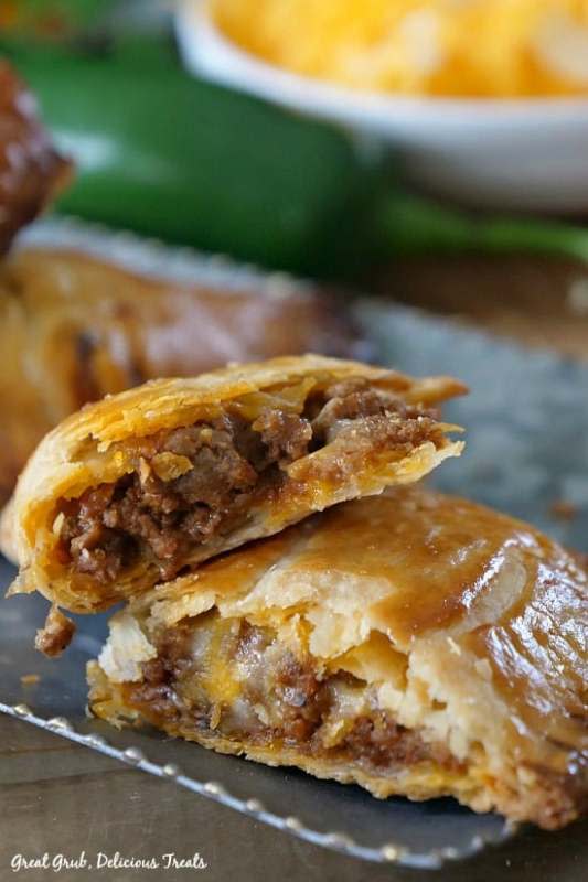 <p>Great Grubs Delicious Treats</p><p>Full of deliciously seasoned ground beef, loaded with two types of cheese and then baked to perfection.</p><p><strong>Get the recipe:</strong> <a href="https://www.greatgrubdelicioustreats.com/cheesy-ground-beef-empanadas/" rel="nofollow noopener" target="_blank" data-ylk="slk:Cheesy Ground Beef Empanadas;elm:context_link;itc:0;sec:content-canvas" class="link rapid-noclick-resp">Cheesy Ground Beef Empanadas</a></p>