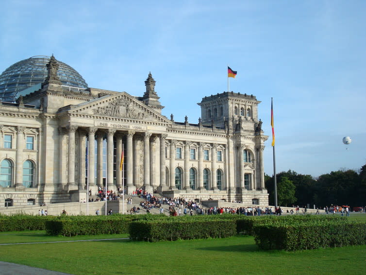 <span class="caption">The home of the German Bundestag.</span> <span class="attribution"><a class="link " href="https://www.flickr.com/photos/martin-gerz/2973253675/in/photolist-5wJGJp-9EyhDJ-dczbQR-5XH8W6-7e882E-7nyoij-8azXFh-cpDJiA-cpDFFJ-HqmV1-7e88d5-afnGsc-HqqeK-7MTsu9-6KrYod-bx9Qu3-nP1Rz2-oVfr1C-eUxjUM-5oc5QP-5oc42n-7UDxvZ-k4BAU-gJFyJ3-5oc3Vr-48BcAR-k4ELe-5ineS3-fPD39b-6mNd8q-pJWSo8-9y9uiu-aecUfc-afqvwE-6ibYNe-7MPxsk-rsAK4f-akWVeB-3bGPS-T9HDLK-fsDGJA-BU9eFP-bZpuH-cixLt9-GVeqEa-oAB7Mr-bfvUea-zoZ1Q6-awgiJW-qafpJ" rel="nofollow noopener" target="_blank" data-ylk="slk:martingerz2/flickr;elm:context_link;itc:0;sec:content-canvas">martingerz2/flickr</a>, <a class="link " href="http://creativecommons.org/licenses/by-sa/4.0/" rel="nofollow noopener" target="_blank" data-ylk="slk:CC BY-SA;elm:context_link;itc:0;sec:content-canvas">CC BY-SA</a></span>