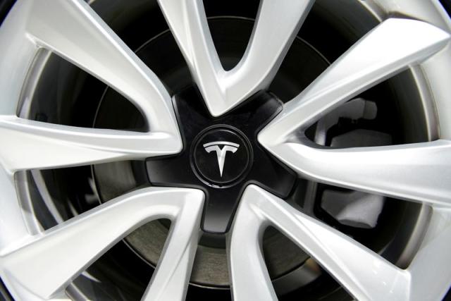 Tesla zooms past $1 trillion market cap on bet that the EV future is