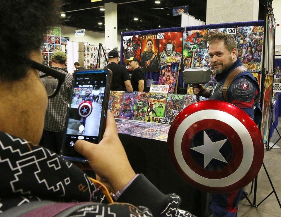 Brian Holdsworth of Weymouth, Mass., dressed as Captain America, poses for a photo during the November 2019 Rhode Island Comic Con.