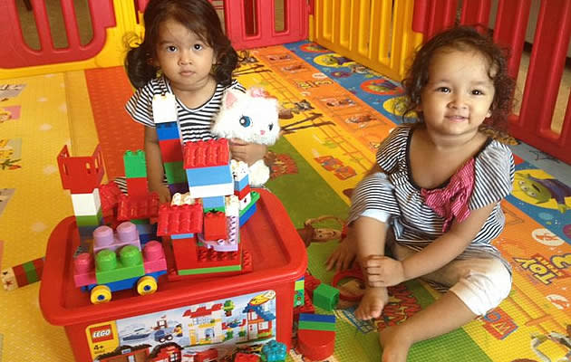 A pair of twins bonding over Lego. (Dharshini Gopalakrishnakone)