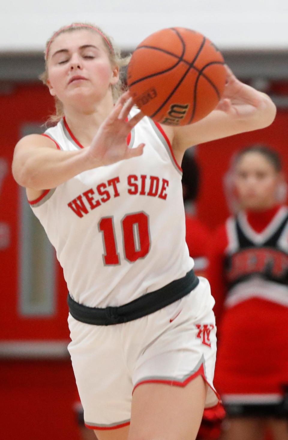 West Lafayette Red Devils Adrianne Tolen (10) passes the ball during the IHSAA girl’s basketball game against the Lafayette Jeff Bronchos, Tuesday, Jan. 16, 2024, at West Lafayette High School in West Lafayette, Ind. West Lafayette Red Devils won 72-36.